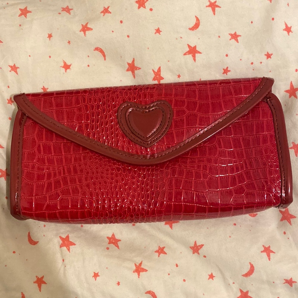 Red snakeskin make up bag